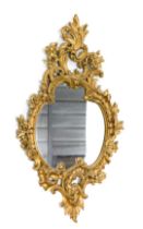 A gilt cartouche shaped rococo mirror, 116cm x 62cm.