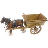 A Beswick Shire horse, pulling wooden cart, 45cm wide.