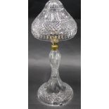 A cut glass table lamp, with silver plated mounts, with a domed shaped shade and tapering base,