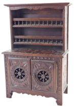 A 20thC French country made miniature dresser, the raised back with two shelves with spindle turned