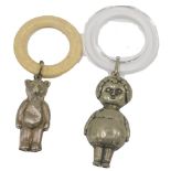 Two child's rattles, comprising a silver plated bear with bone teething ring, and a silver plated gi