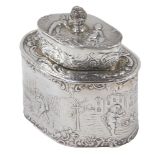 A Victorian silver tea caddy, with high relief decoration of children in town scene, an acorn finial