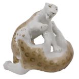 A USSR porcelain figure group of two leopards play fighting.