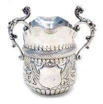 A Victorian silver jug, with double spout, cast scroll handles, engraved decoration, London 1887, 5o