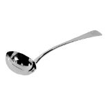 A Victorian silver serving fiddle pattern ladle, with a lion crest, London 1885, 1.66oz.