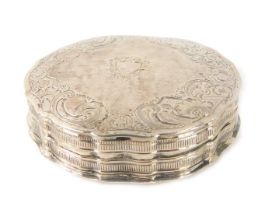 A late 19thC silver pill box, of circular form with engine turned decoration of scrolls with vacant