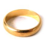 A wedding band, of plain design, yellow metal stamped 14k, ring size K, 2.8g.