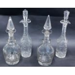 A pair of 19thC cut glass decanters and stoppers, with tapering stopper, 35cm high, and a pair of cu