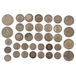 A group of pre-1946 silver coins, shillings, half shillings, florins, etc., 196.5g all in.