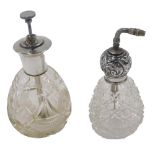 Two cut glass atomizers, each with a silver plated and silver rim, 15cm and 12cm high. (2)