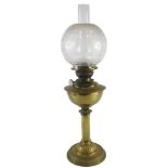 A late 19th/early 20thC oil lamp, with canted reeded column and domed foot, and a partly etched shad