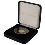 A Jubilee Mint Queen's 88th Birthday 22ct gold proof one pound coin, in presentation case with certi