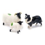 Three Beswick animals, comprising a ram, 8cm high, a lamb, 4cm high, and a sheepdog, 7cm high. (3)