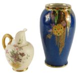 A Royal Worcester blush ivory porcelain jug, decorated with flowers, and a crown Devon lustre vase,