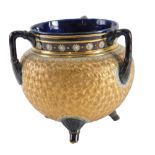 A Doulton Lambeth tyg or three handled cauldron, with incised decoration in gilt, within brown and b