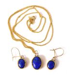 A 9ct gold lapis lazuli set pendant and earring set, the oval pendant 2cm high, on fine link neck ch