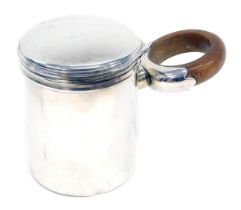 A Victorian silver lidded canister, with turned wooden loop handle, London 1837, 7oz all in, 9cm hig