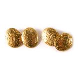 A pair of 18ct gold cufflinks, each of engine turned floral decoration, with chain link, 17.8g, in a