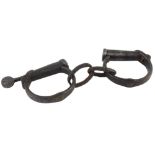 A pair of Hiatt Wrough Warranted handcuffs, numbered 55.