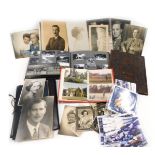 A quantity of photographs and other ephemera.