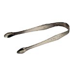 A pair of Hester Bateman silver sugar tongs, each with engine turned floral decoration, stamped HB,