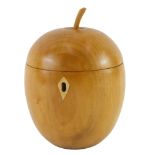 A turned fruitwood tea caddy, modelled in the form of an apple, probably late 20thC/early 21stC, 15c