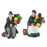 Two Royal Doulton porcelain figurines, The Old Balloon Seller, and The Balloon Man.