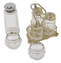 A dressing table set, comprising three piece cruet, with silver plated rims, a pair of silver rimmed