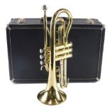 A Blessing Scholastic brass trumpet, with fitted case.