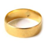 An 18ct gold wedding band, of plain design, ring size U, 4.9g.