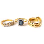 Three costume jewellery rings, comprising a snake ring, and two plated and paste stone set rings. (3