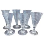 Six various 19thC ale flutes, each with spiral decoration, the largest 14cm high.