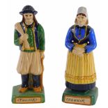 A pair of Henriot Quimper Faience figures, of gentleman and a lady stamped Fanchik and Channik respe