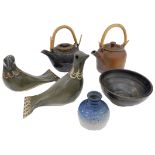 A quantity of studio pottery, to include a pair of doves, two teapots, an unmarked blue glaze vase,