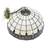 A Tiffany style opaque stained glass light fitting, decorated with red coloured cabochons.