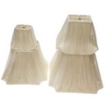 A collection of Chinese fabric coloured lamp shades, to include three black examples. (AF)