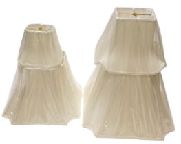 A collection of Chinese fabric coloured lamp shades, to include three black examples. (AF)