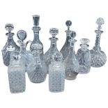 A collection of 19thC and later decanters and stoppers, to include a mallet shaped claret jug, a pai