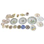 A quantity of small novelty French Faience pieces, to include two Quimper fish dishes, small plates,