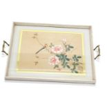 A cream painted tray, inset with a Chinese picture of a bird and flowers, etc., 555cm wide.