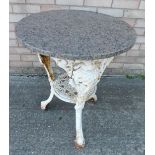 A cast iron pub or garden table, stamped Gaskell Chambers Limited Bar Fitters Nottingham, with grani