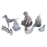 A collection of Royal Copenhagen and other Danish ceramic pieces, to include a dalmation, a fawn wre