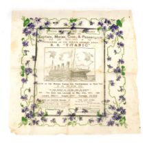 A paper handkerchief, made as a souvenir for the loss of the SS Titanic, printed with the ship, vari