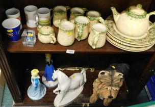 A large dog ornament, Frozen figures, Portuguese white finish horse, mottled tea wares, etc. (2 shel