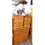 Two pine three drawer bedsides, piecrust table, and a pine chest of two short and four long drawers.