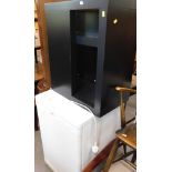 A Bosch Exxcel Max Freedom Performance fridge, and a black finish side table.