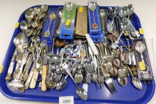 A collection of souvenir spoons.