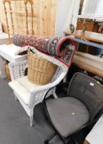 A rush back office chair, bamboo conservatory chair, Eastern style rug, two wicker baskets, towel ra