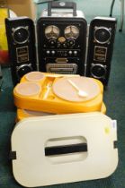 A Spirit of St. Louis flight radio and a four tier orange and cream picnic set.