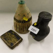 A pewter flagon, a niello style Eastern cigarette case, and a studio pottery vase. (3)